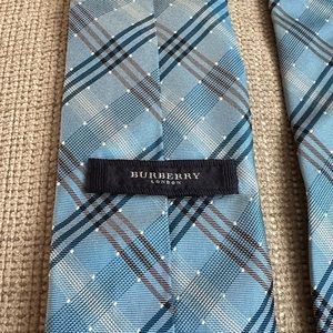 Burberry tie. No flaws. Excellent condition.